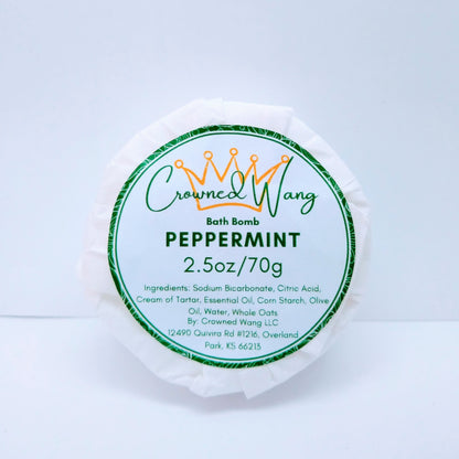 Crowned Wang brand 2.5oz peppermint bath bomb with green and white label. The label also includes a yellow crown outline.